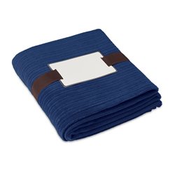 Manta polar de suave vellón rayado azul envuelta en una cinta y con tarjeta de regalo · Merchandising promocional de Cocina y Hogar · Koala Rojo